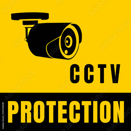 CCTV camera isolated on yellow background