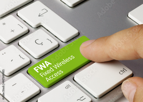 Картината върху платно FWA Fixed wireless access - Inscription on Green Keyboard Key.