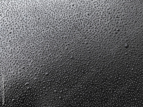 Morning Dew on a Black Floor. Perfect for Background