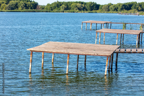 Wooden footbridge on the lake