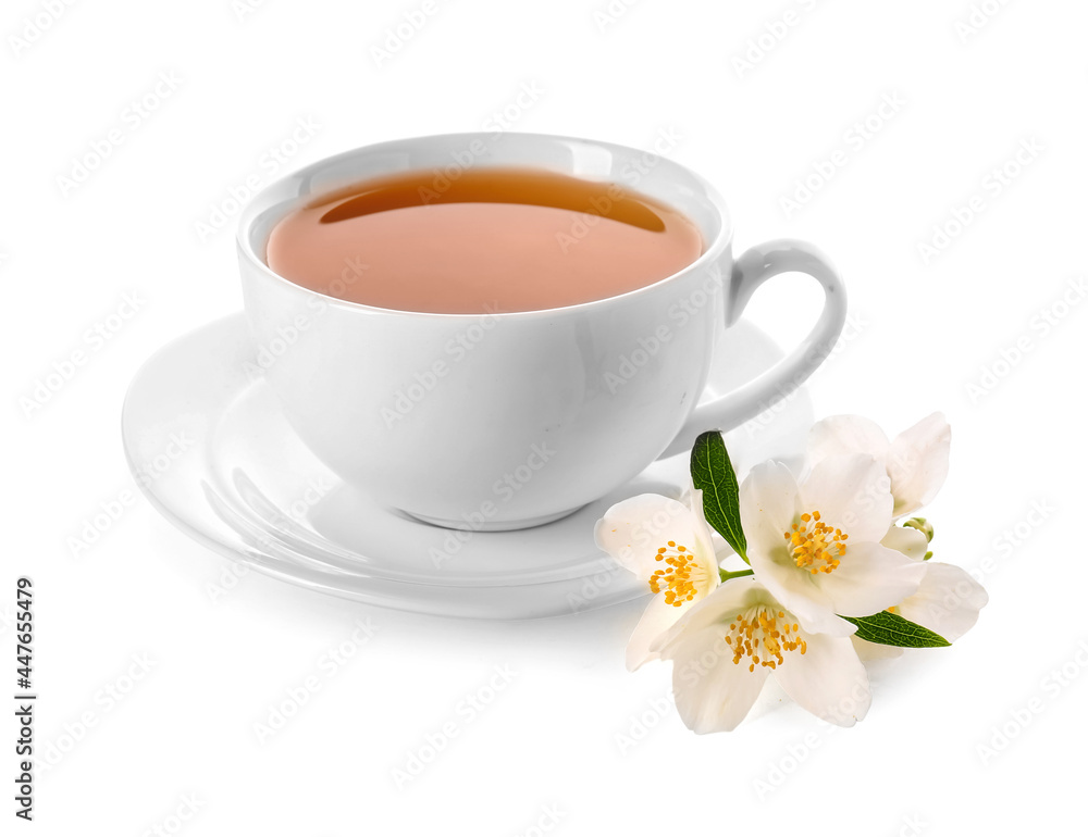 Cup of jasmine tea and flowers on white background Cup of jasmine tea and flowers on white background