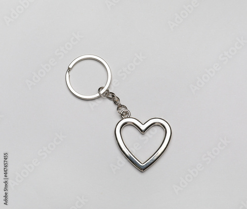 Heart shape keychain on grey background