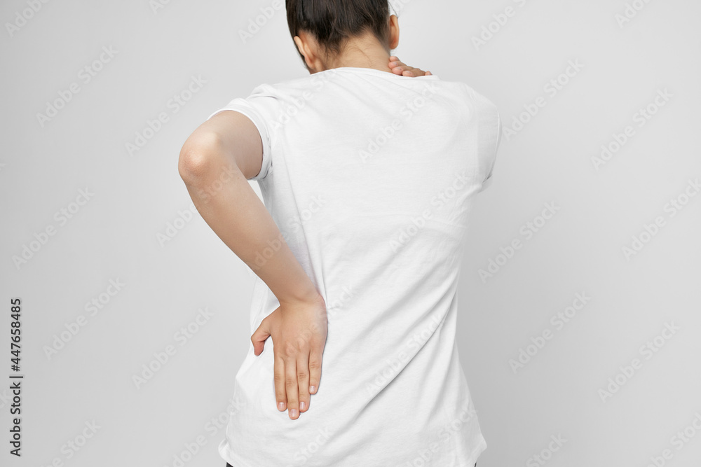 woman holding her lower back back pain health problems woman holding her lower back back pain health problems