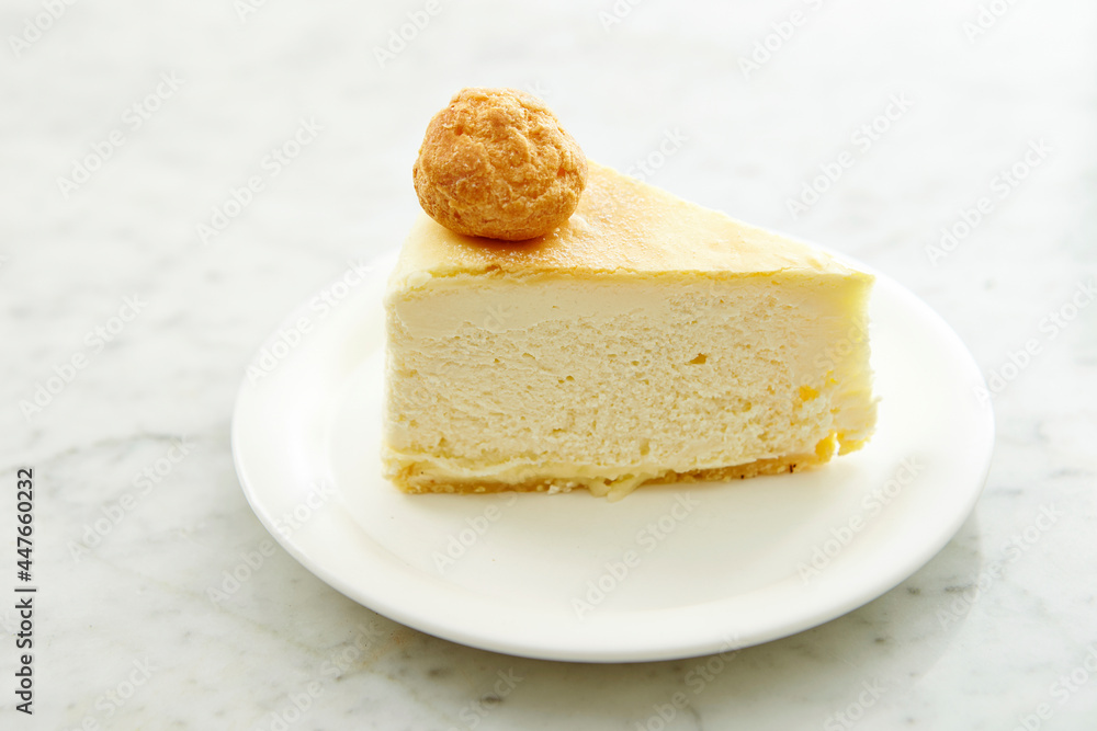 A slice of cheesecake on a plate A slice of cheesecake on a plate
