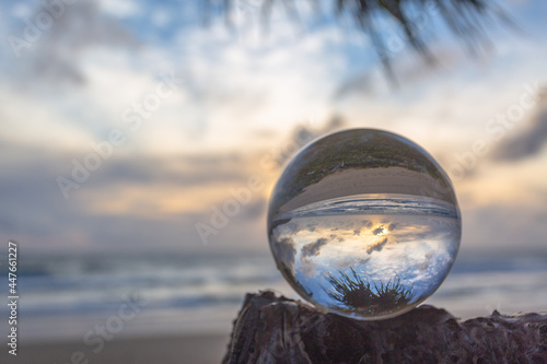 Unconventional and beautiful natural views of the sea in a magic crystal ball. .Nature video High quality footage..Unique and creative travel and nature idea videos 4K clips. © Narong Niemhom