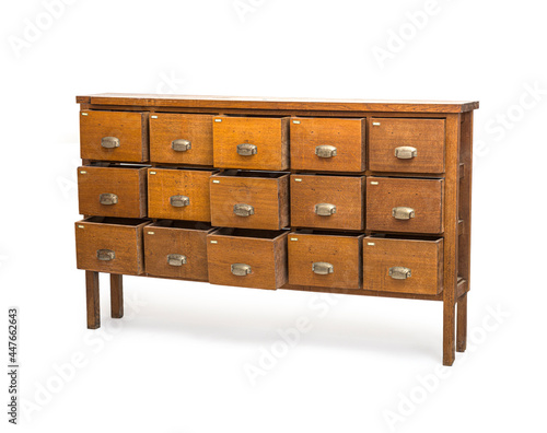 ancient wooden chest with opend drawers isolated photo