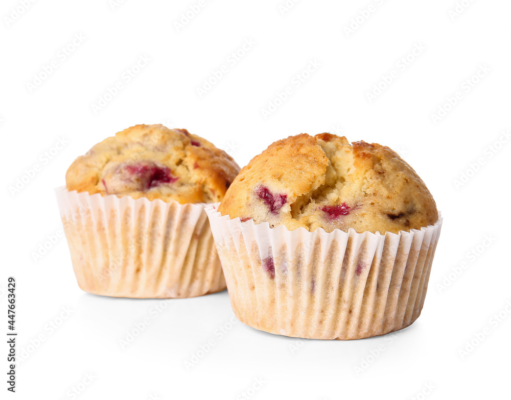 Tasty raspberry muffins on white background Tasty raspberry muffins on white background