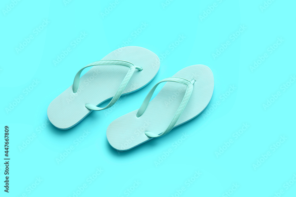 Stylish flip-flops on color background Stylish flip-flops on color background