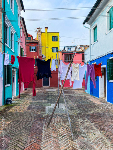 фотографія Laundry put to dry on a small traditional and very colorful place on the island