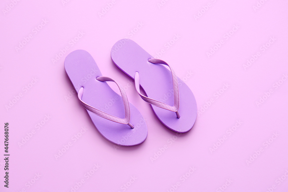 Stylish flip-flops on color background Stylish flip-flops on color background