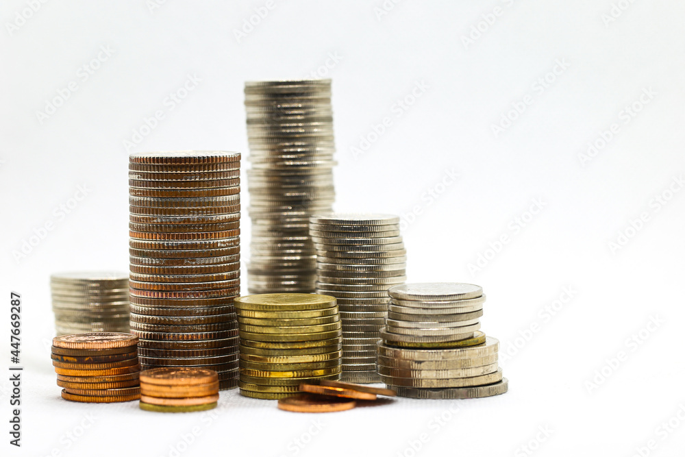 Piles and heap of metal and gold coins place on white background. Financial template and Investment idea for articles and design. Piles and heap of metal and gold coins place on white background. Financial template and Investment idea for articles and design.