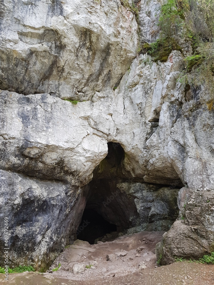 Stone cave entrance of prehistoric ancient man Stone cave entrance of prehistoric ancient man