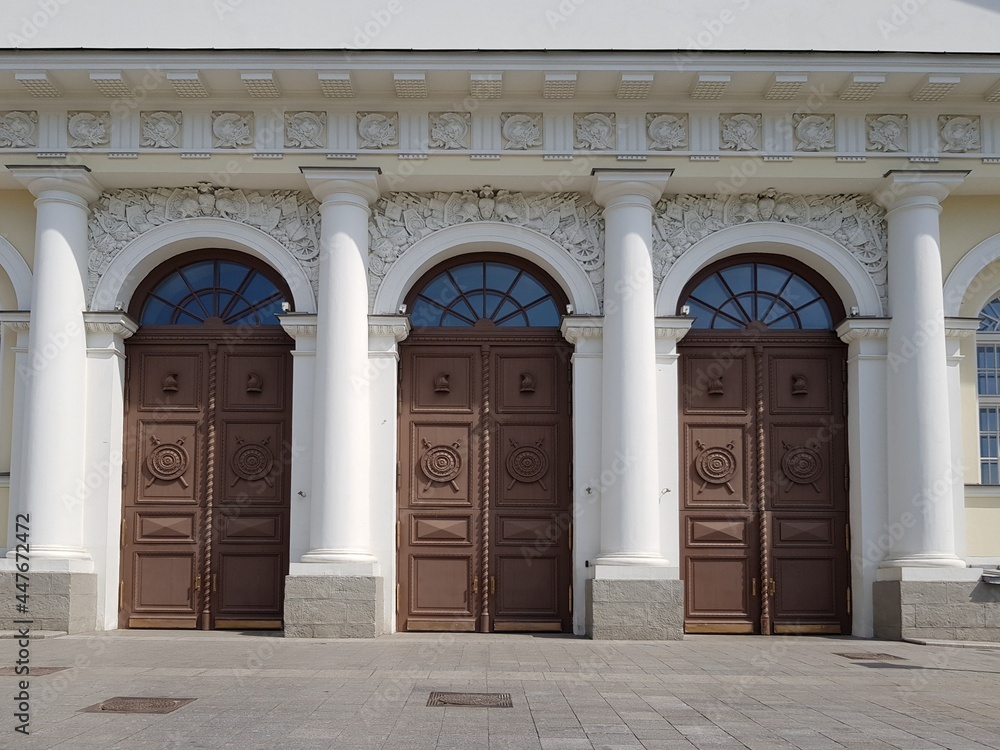 Three antique doors in a stone building