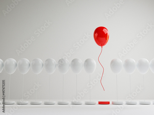 Red balloon floating out from white balloons that are tied to the platform on white background , Performance outstanding from crowd for different thinking , disruption and leadership by 3D rendering. photo