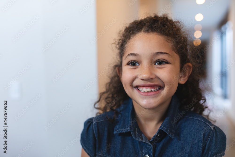 Portrait of happy mixed race girl looking at camera Portrait of happy mixed race girl looking at camera