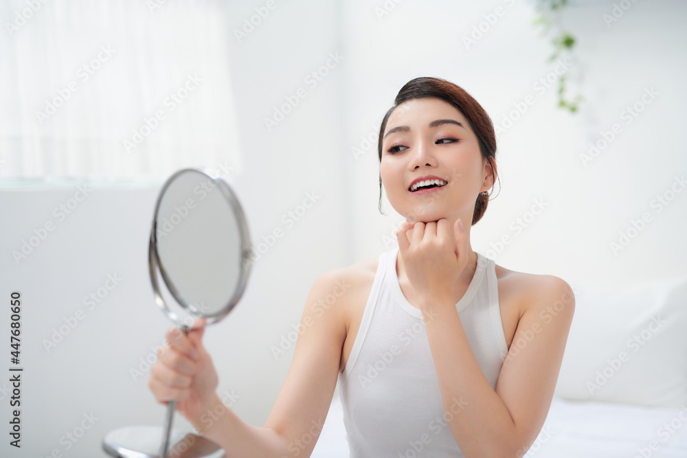 Beautiful face of young adult woman with clean fresh skin Beautiful face of young adult woman with clean fresh skin