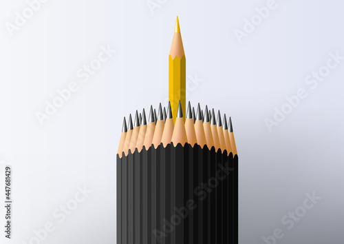 Concept du leadership et du commandement avec le symbole d’un crayon jaune entouré d’une foule de crayons noirs.