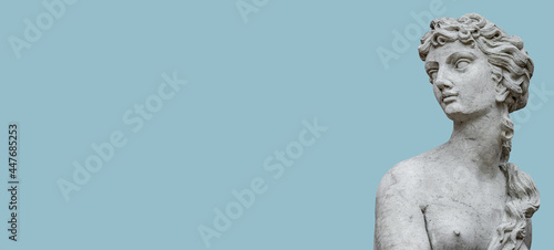 Fotografering Banner with old statue of sensual bathing Renaissance Era woman at solid blue sky background with copy space, Potsdam, Germany, details, closeup