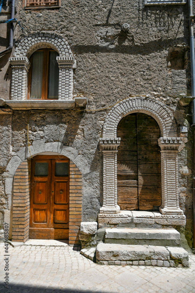 Carpineto Romano, Italy, July 24, 2021. The facade of an old house in the historic center of a medieval town in the Lazio region. Carpineto Romano, Italy, July 24, 2021. The facade of an old house in the historic center of a medieval town in the Lazio region.