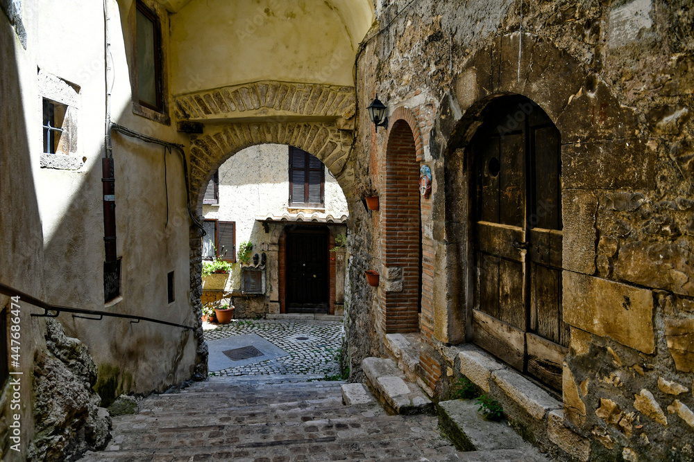 Fototapeta premium Carpineto Romano, Italy, July 24, 2021. A street in the historic center of a medieval town in the Lazio region.