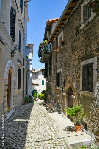 Fototapeta Naklejka Na Ścianę i Meble -  Carpineto Romano, Italy, July 24, 2021. A street in the historic center of a medieval town in the Lazio region.