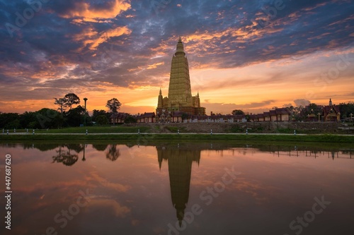 Beautiful temple at Wat Mahathat Wachiramongkol, Krabi Province,  Thailand. See the reflections that add to the attractiveness. © Worawit