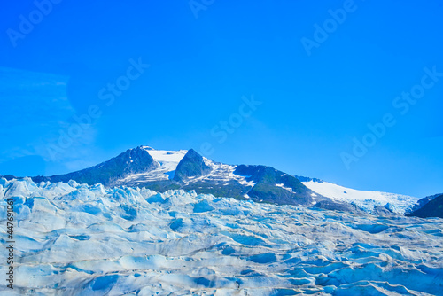 Looking down on the glacier from the helicopter window. It was amazing. A helicopter ride with a view of the glacier. Juneau, Alaska, USA. June 2019.