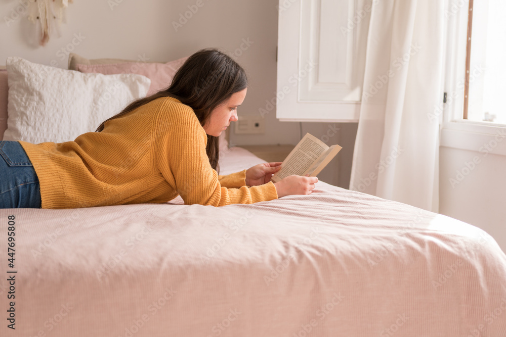 girl reading lying in bed girl reading lying in bed