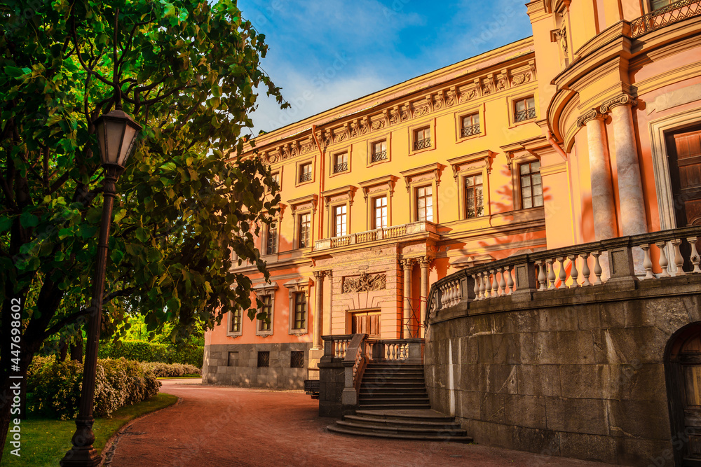 The beautiful facade of the Mikhailovsky Castle in the city center in summer. A tourist attraction. Saint Petersburg, Russia - 11 June 2021