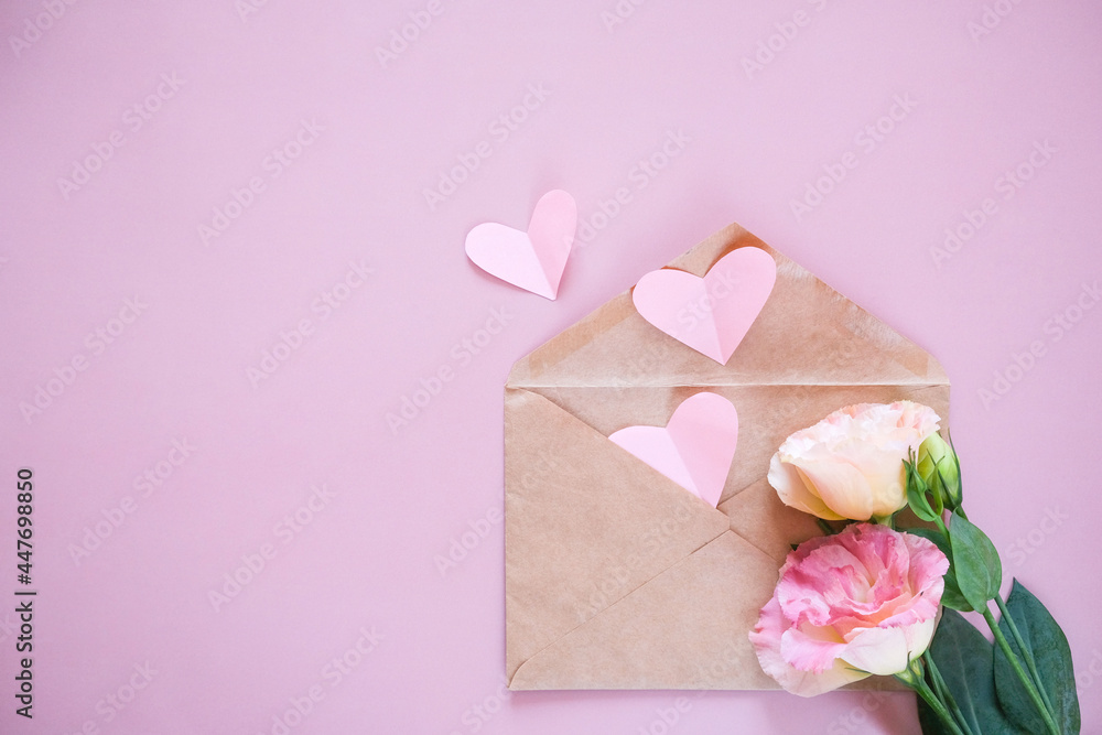 Creative minimal Valentine's Day concept. Envelope, valentines, white and pink heart confetti on a pastel pink background. Flat lay, top view, copy space
Creative minimal Valentine's Day concept. Envelope, valentines, white and pink heart confetti on a pastel pink background. Flat lay, top view, copy space