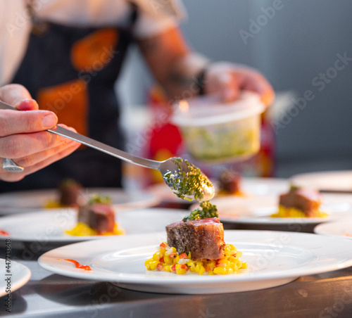 Chef Preparing Plates in a Restaurant