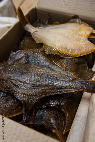 Smoked fish in craft paper ...
