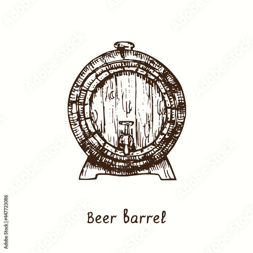 Beer barrel front view with tap. Ink black and white doodle drawing in woodcut style.