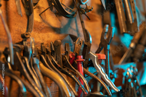 A lot of old rusty instruments in vintage dirty garage