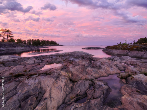 Island shore on lake Ladoga. Summer landscape. Wild nature