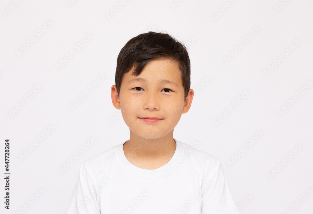 Portrait of asian happy boy smile face and looking at camera on white background Portrait of asian happy boy smile face and looking at camera on white background