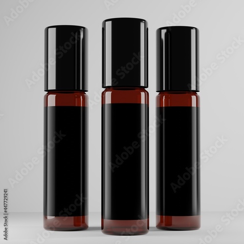amber roller ball bottle with black cap and blank label for mockup  © Josephait