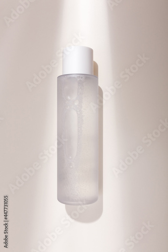 Quadro em tela Mock up bottle of essence toner with no label in trendy natural light