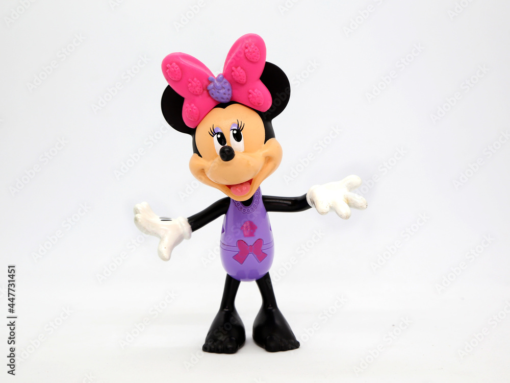 Minni Mouse in a bathing suit or underwear and without shoes. Toy. Cartoon  character from Walt Disney Pictures Studios. Minnie is Mickey Mouse's  girlfriend. Isolated white. Plastic toys for childrens. Stock Photo
