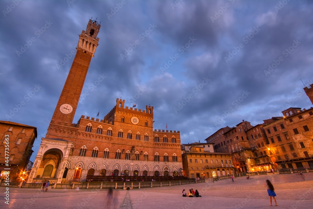 Fototapeta premium The Campo Square with Mangia Tower the landmark of Siena, Italy.