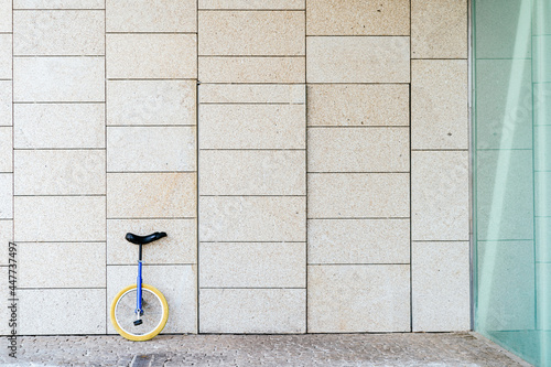 Wallpaper Mural Unicycle parked near modern building Torontodigital.ca