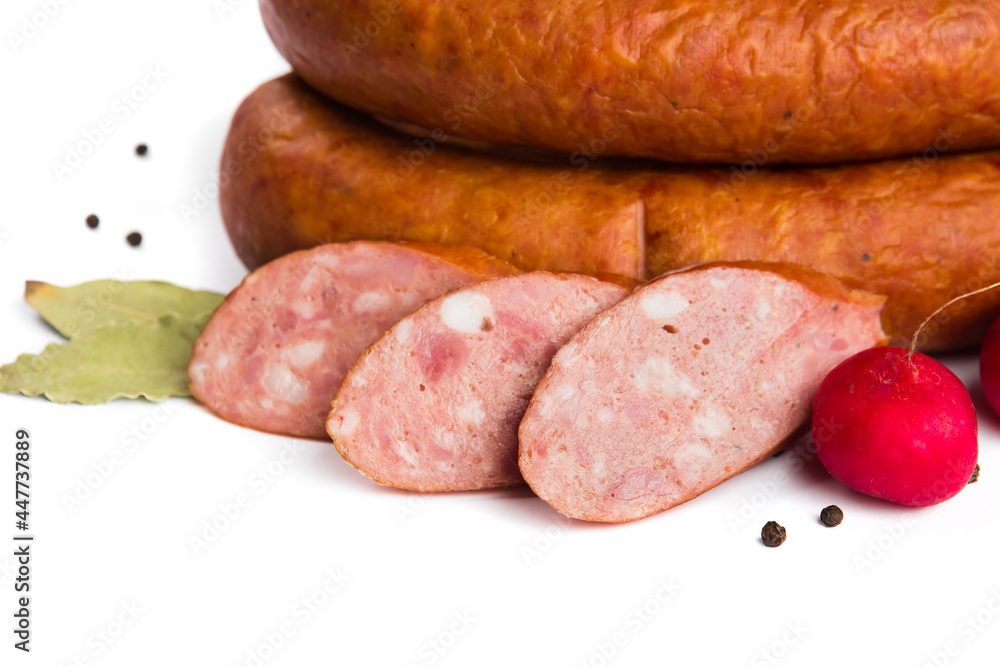 baked smoked sausage with lard on a white plate baked smoked sausage with lard on a white plate