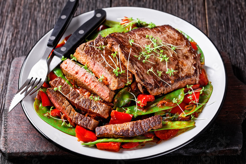 grilled Beef Flank Steak with braised vegetables