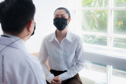 wearing a medical mask in using a new life during work or conversation indoor to prevent infection with COVID-19 or corona virus And stay outside the building to prevent dust, pollution in the air.