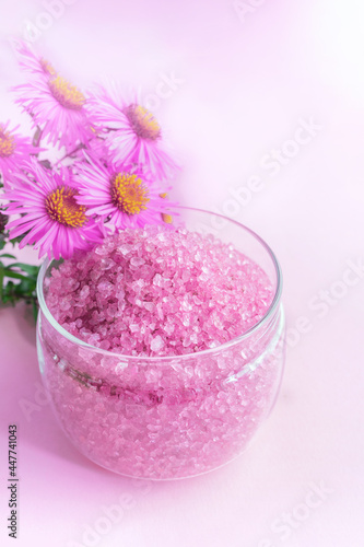 Lavender sea salt in a glass jar close-up. copy space. Selective focus. Copy space