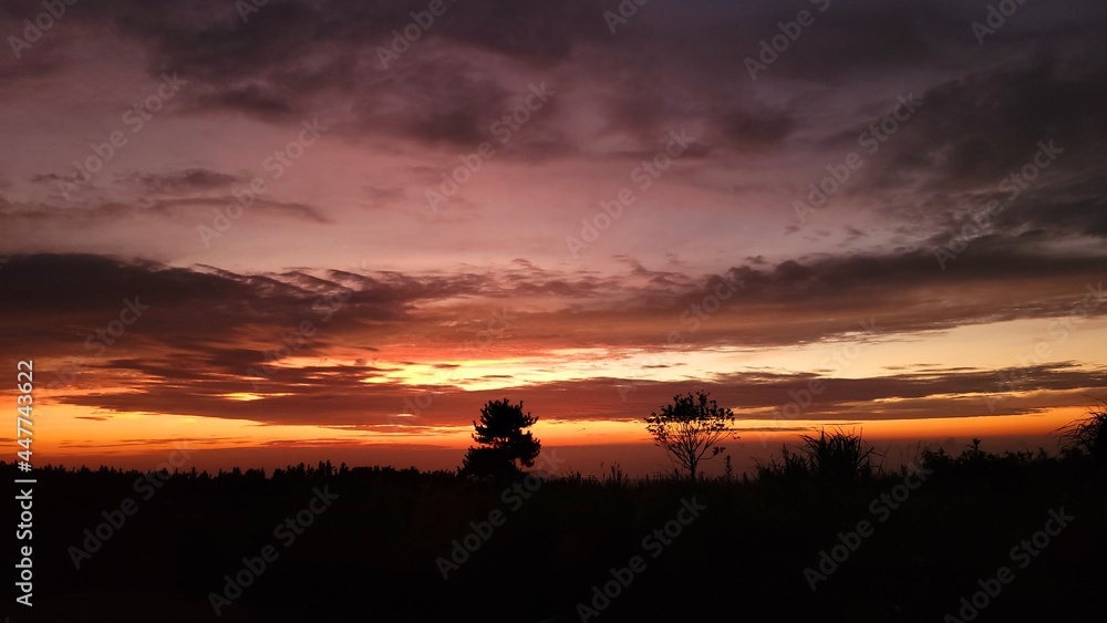 a red sunset, Sunset, a sunset scene, sunset scenery, Sunset in Jeju Island Korea