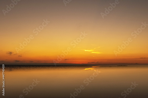 Sunset on the sea in cloudy weather. Nature background © Светлана Густова