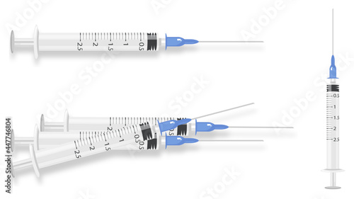blue syringe on white