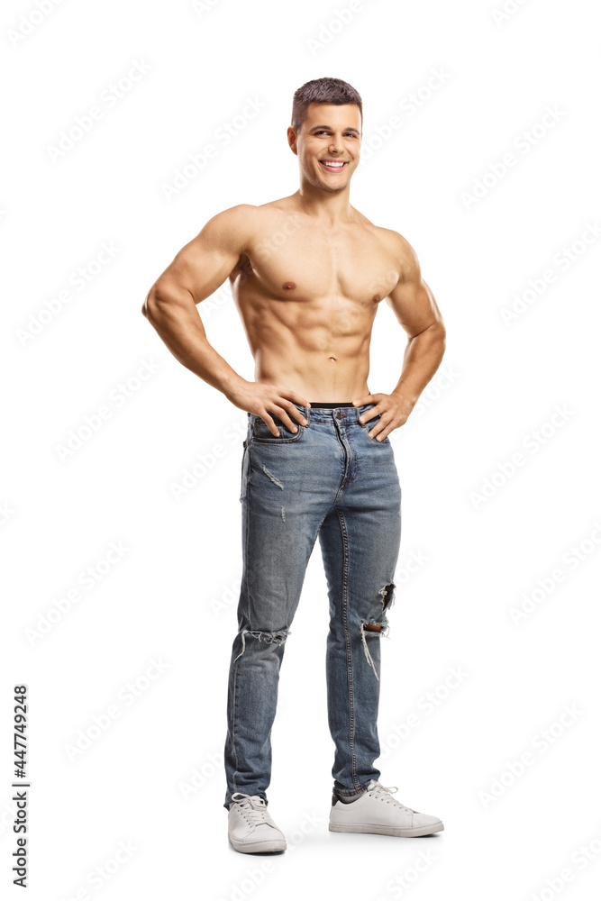Full length portrait of a smiling shirtless man wearing jeans and posing Full length portrait of a smiling shirtless man wearing jeans and posing
