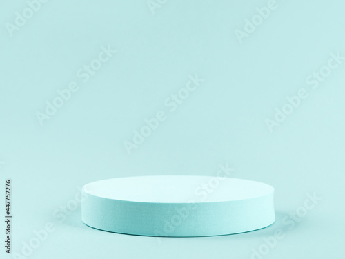 Round geometric shape turquoise podium for product display and text © tenkende